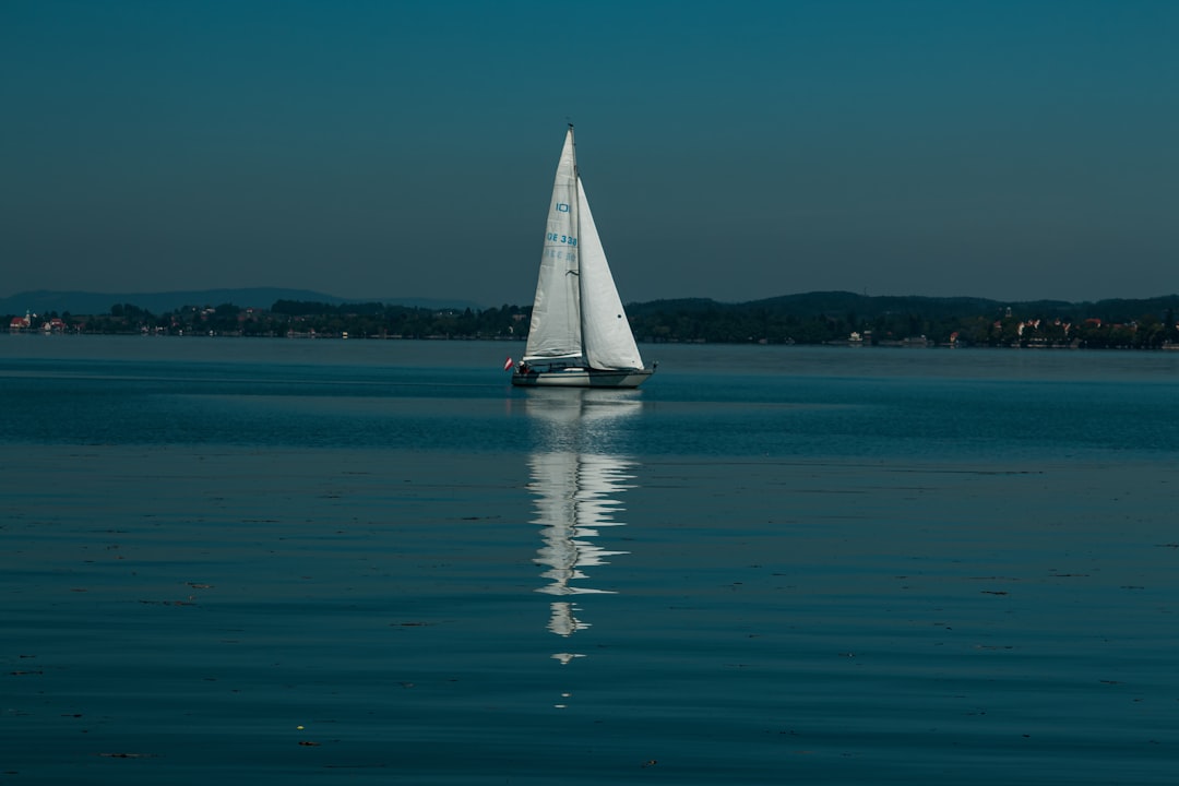 white sailboat on sea during daytime