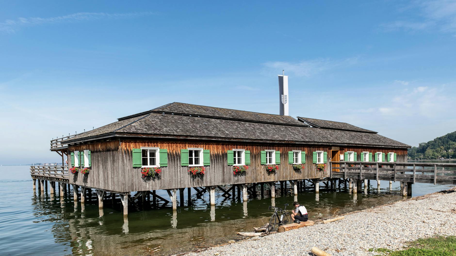Explore a classic wooden stilt house on Lake Constance in Bregenz, Austria, perfect for travel inspiration.