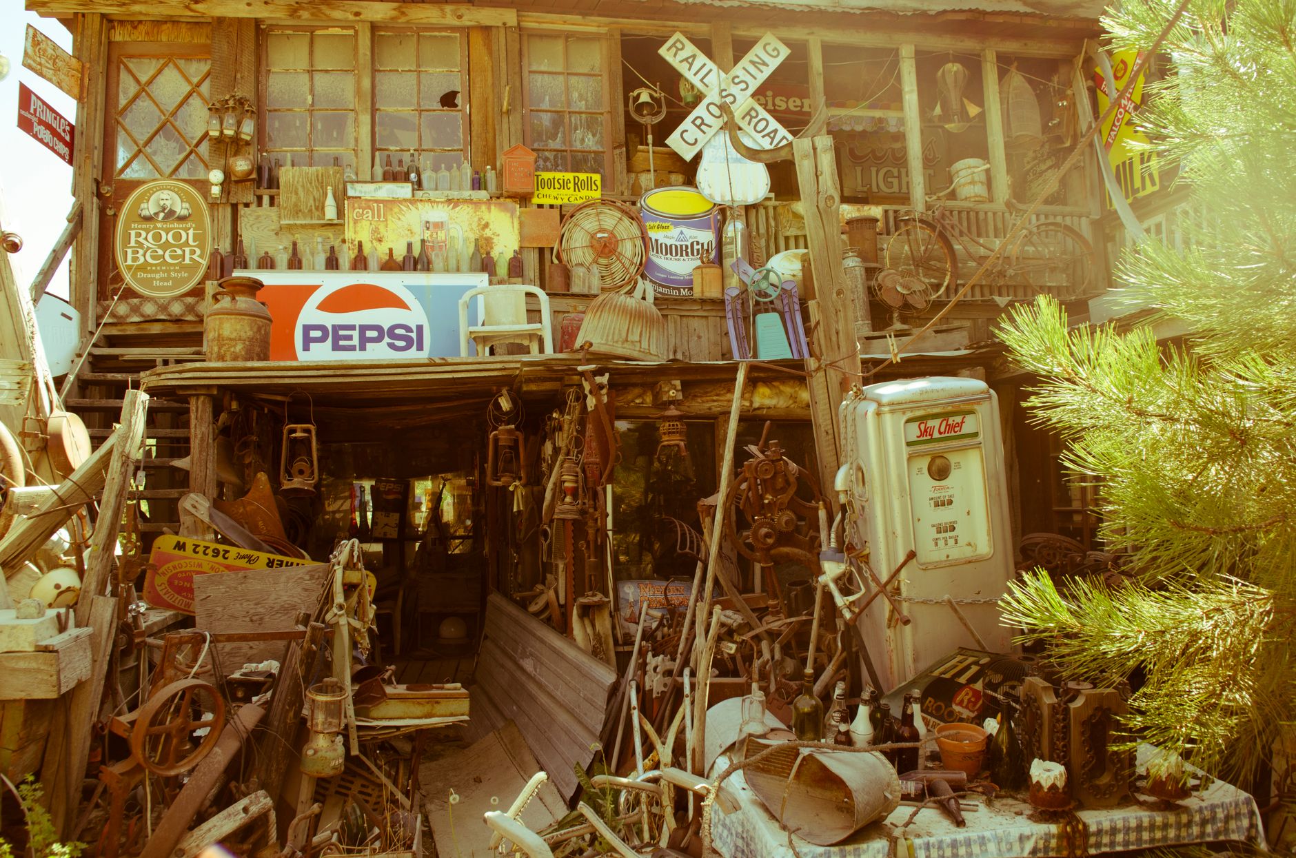 A vintage store filled with antique signs, rustic decor, and collectibles, creating a nostalgic ambiance.