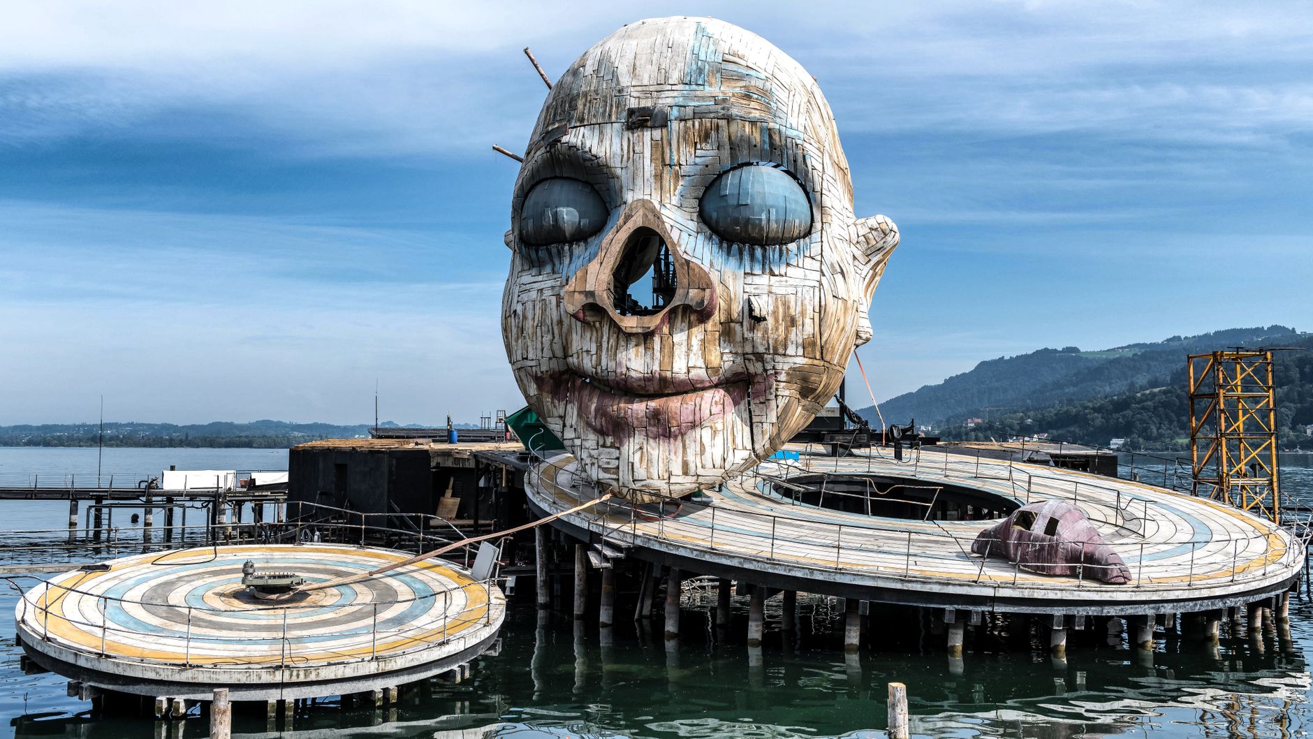 A striking stage setup on Lake Constance with a large face sculpture in Bregenz, Austria.